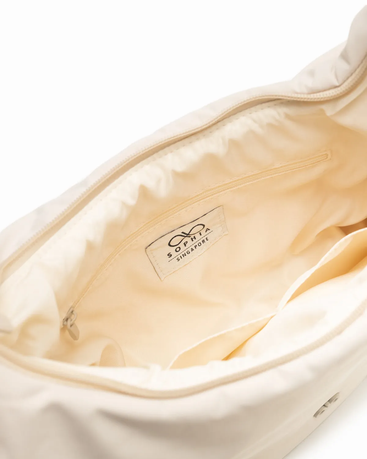 L COSY LUXE CRESCENT BAG IN OAT